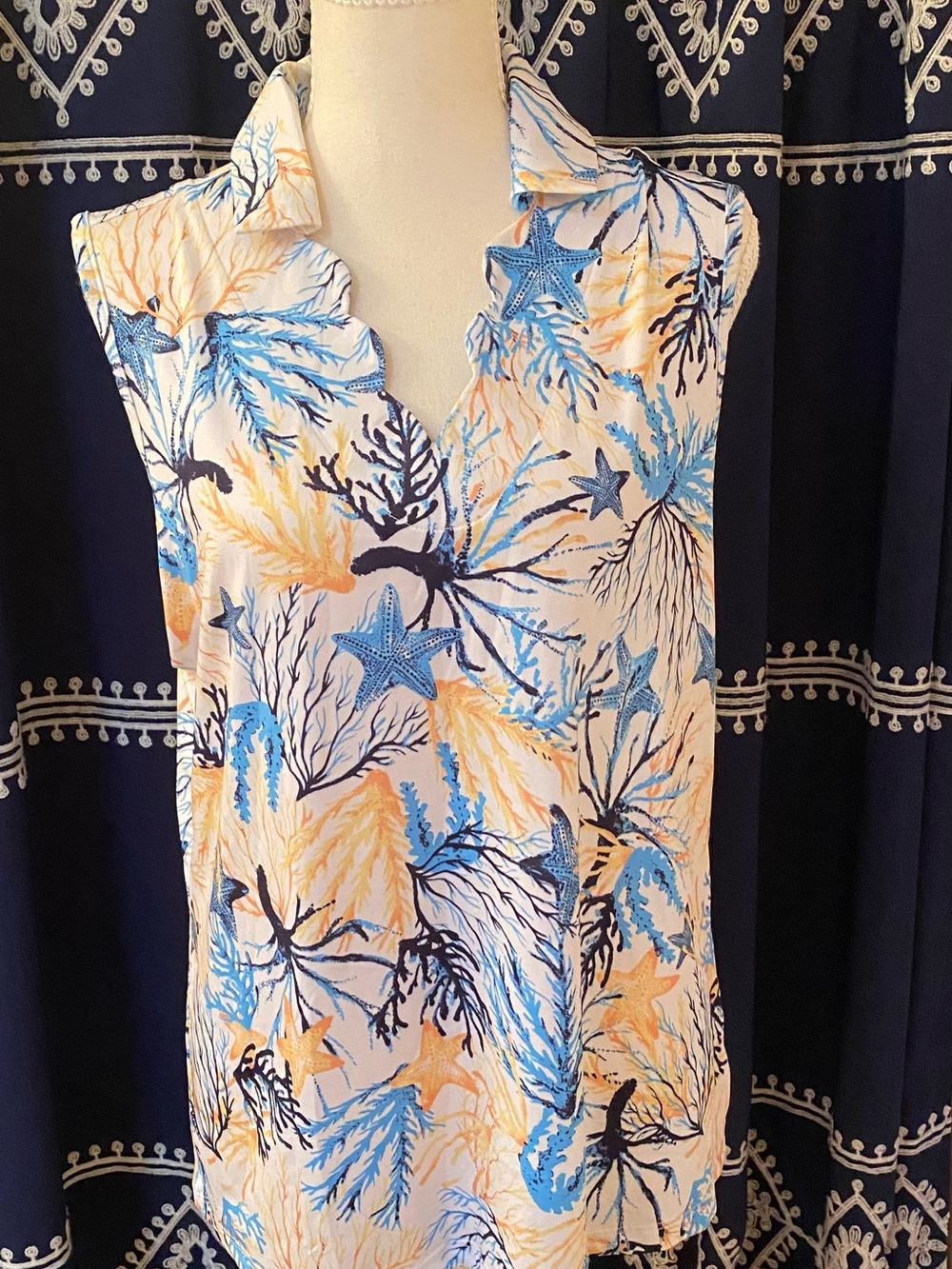 Sleeveless Scalloped V-Neck Women’s Shell Top with matching skortin Blue & Cream